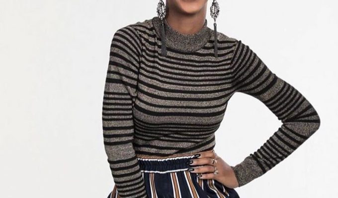 Nandi Madida smiling