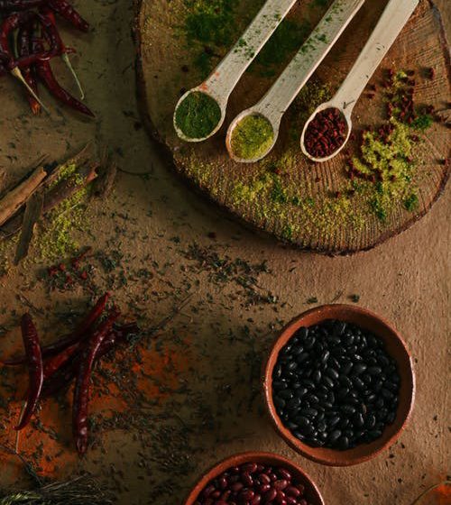Spices displayed on a wooden surface