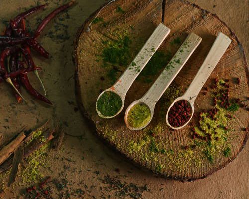 Spices displayed on a wooden surface