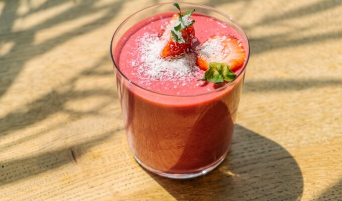 red smoothie in a glass