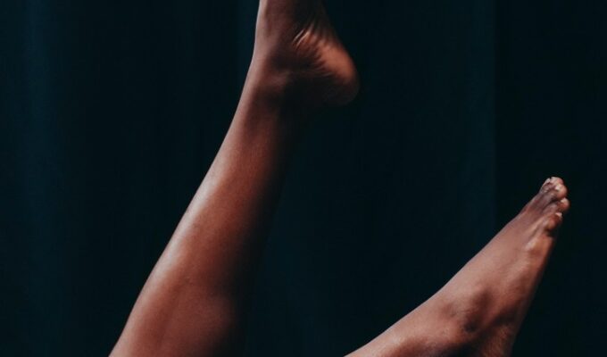 feet of a black woman raised up