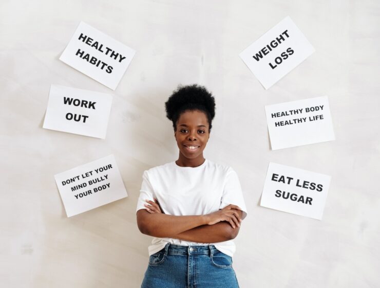 Black woman surrounded by healthy habits text