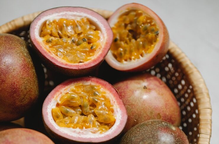 indigenous fruits like passion fruit displayed in a basket