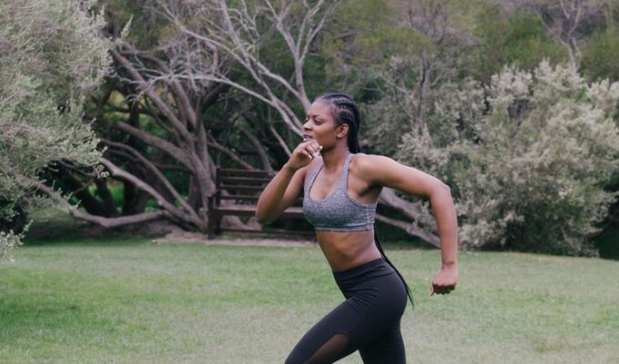 Black woman running as a way of lifestyle changes