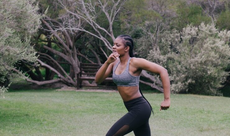 Black woman running as a way of lifestyle changes