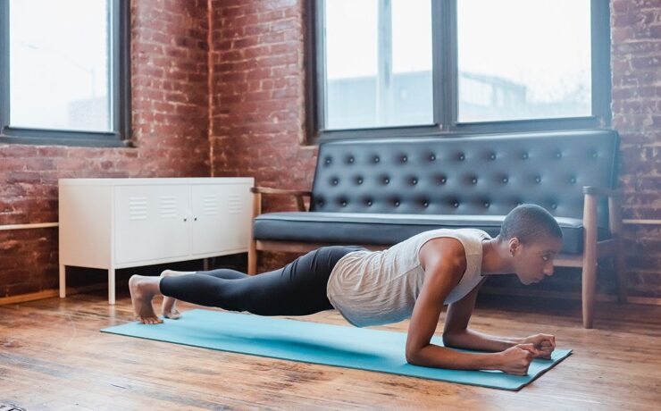 Black woman doing abs workout
