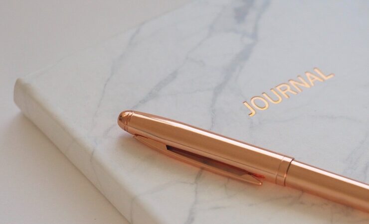 a notebook and pen for journaling