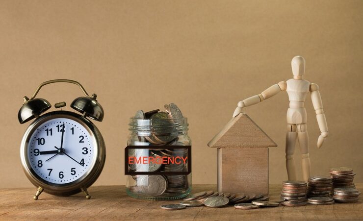 emergency funds demonstrated through a clock and coins in a bottle and on a surface