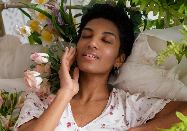 Young African woman engaging in self-care rituals