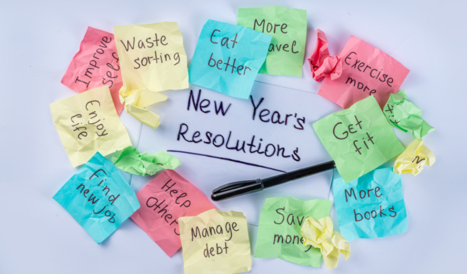 sticky notes with new year goals to signify year end self assessment